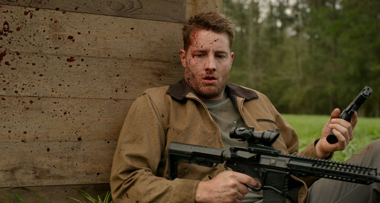 The Hunt 2020 Movie Dean J. West Hiding with guns