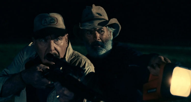 Boar 2017 Movie John Jarratt and Roger Ward with a rifle aiming at the monster boar scene