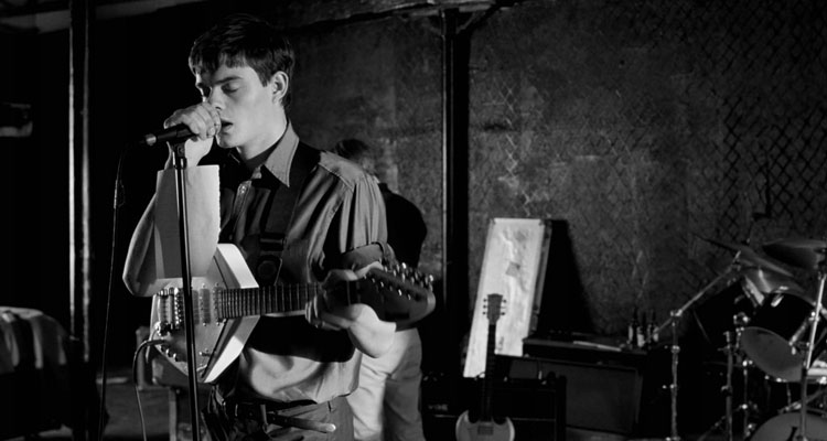 Control 2007 Movie Sam Riley as Ian Curtis singing in a studio