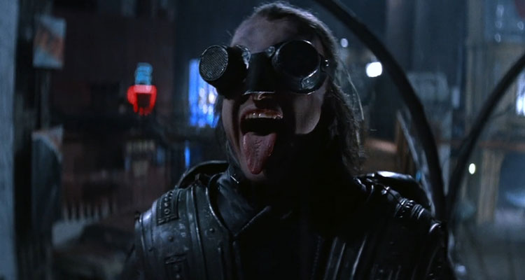 Highlander II The Quickening 1991 Movie Scene Corda, Katana's henchman with crazy welding glasses cackling as he's looking at an explosion