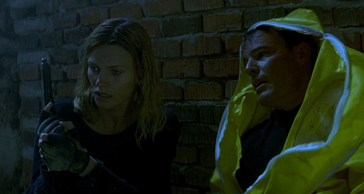 Adrenalin Fear the Rush 1996 Movie Scene Natasha Henstridge as Delon and Andrew Divoff as Sterns talking in the tunnel
