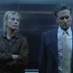 The Game 1997 Movie Scene Michael Douglas as Nicholas Van Orton and Deborah Kara Unger as Christine in an elevator