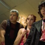 Dance of the Dead 2008 Movie Scene Jared Kusnitz as Jimmy, Greyson Chadwick as Lindsey, and Mark Oliver as Coach Keel realizing that prom is overrun with zombies