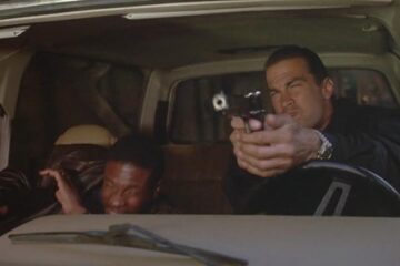 Marked for Death 1990 Movie Scene Steven Seagal as John Hatcher shooting from his vehicle with Keith David as Max ducking to avoid the oncoming fire