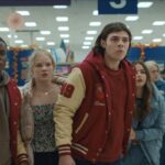 Thanksgiving 2023 Movie Scene Mika Amonsen as Lonnie, Gabriel Davenport as Scuba and the rest of the gang during a black friday sale